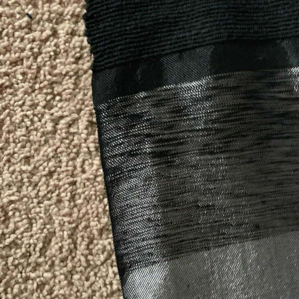 Black an silver material or table cloth